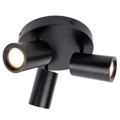 Black ceiling light fixture with three adjustable cylindrical spotlights, each emitting a warm glow.